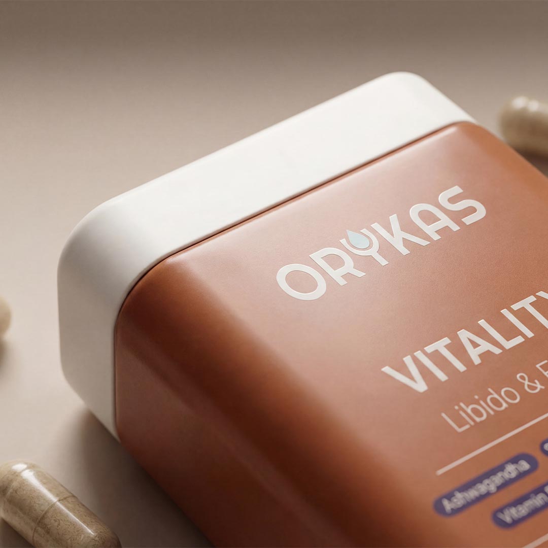 Orykas capsules in hand — daily support alongside Orykas washable incontinence underwear — view 3